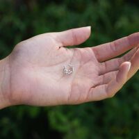 Ohrklemme Blume silber aus Messing für Damen