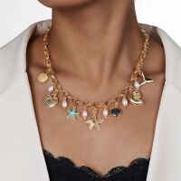 Kette Choker goldfarben mit Beach-Anhängern aus...