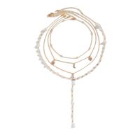 Layering-Kette goldfarben Perlen und...