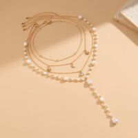 Layering-Kette mehrteilig goldfarben mit Perlen und Kristall-Anhängern für Damen aus Messing