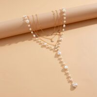 Layering-Kette mehrteilig goldfarben mit Perlen und Kristall-Anhängern für Damen aus Messing