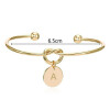 Buchstaben Armreifen aus Messing gold Unisex - Buchstabe L