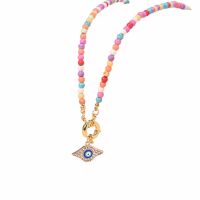 Kette Choker Perlen pastell/goldfarben Evil Eye Messing...