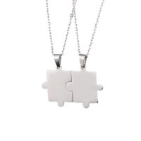 Partnerketten-Set mit Puzzle-Anhänger verschiedene Farben aus Edelstahl Unisex Silber