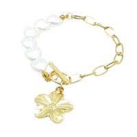 Armband mit Perlen, Blüte und Knebelverschluss gold...